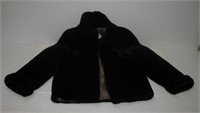 Ladies fur? jacket. Size unknown. Has rip inside.