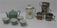 Asian tea pot and (4) Matching cups, (4) Metal