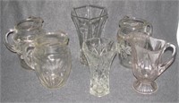 (6) Clear glass vases and juice pitchers. All are