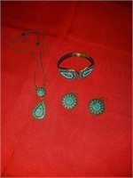 Beautiful turquoise colored necklace earrings and