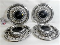 4  enjoliveurs Chrysler hubcaps