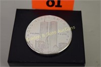 SILVER ONE OUNCE ROUND DEPICTING 10 YEAR