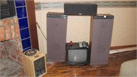 Speakers (3) and small TV plus portable space