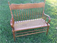 Cane seat pressed back  wooden bench
