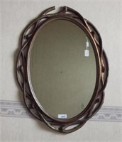 Framed mirror. Oval.