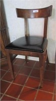 Chair wood frame black seat. Rounded wood for