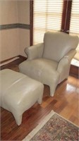 Plush settee with matching ottoman. Beige. Seems