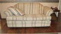 Sofa and settee. Striped upholstery. Side table