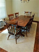 Stunning wood dining table with six matching