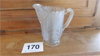 Anthemion pattern glass water pitcher, some
