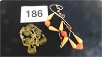 Two yellow/orange necklaces