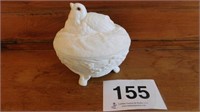 Robin on nest milk glass covered dish, tail
