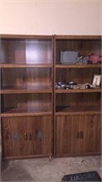 Four bookshelves with lower closed off storage