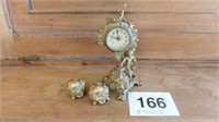 2 ring caskets and dresser clock with cupid, very
