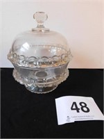 Clear glass _________ covered bowl on low stand