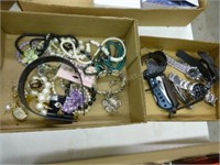 2 Boxes of misc. jewelry - watches - knives