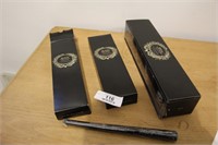 2 Boxes Of Black Tapered Candles  Etc.