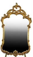 CARVED AND GILDED FRAMED MIRROR