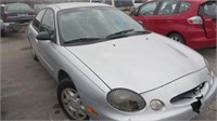 1999	Ford	Taurus	Silver	1FAFP52U2XG195562