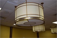 3 Chandeliers with shades located in the