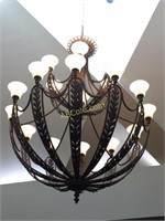 Large chandelier in hotel lobby. Alabaster glass