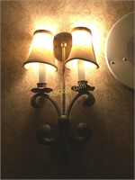 Pair of double sconces at elevator, 3rd floor.