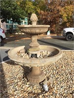 Large outdoor fountain with upper and lower