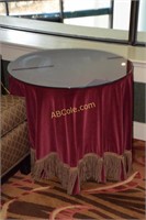 Pair of round tables, Cloth covered with glass