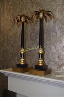 A pair of candlesticks with Palm tree motif