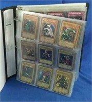 Binder with 183 Yugioh cards & 12 Naruto cards