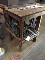 Work table with drill bits