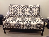 WOOD AND UPHOLSTERED LOVE SEAT
