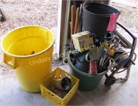 Trash barrel, water cans, plastic tub w/yard tools