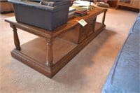 Wooden coffee table with shelves and