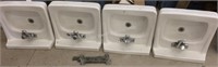 (4) ceramic sinks with faucets