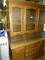 Lighted hutch with glass shelves