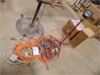 Lot of extension cords and halogen shop light