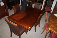 Contemporary Table w/ 4 leather padded Chairs