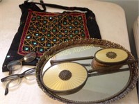 vintage purse, brush mirror tray, old glasses