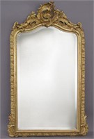 French Louis XV style carved gilt framed mirror
