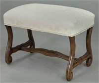 French upholstered stool with scrolled legs