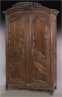 Large French carved walnut 2-door armoire