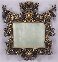 Venetian Baroque style carved parcel-gilt mirror