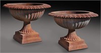 Large pair of cast iron garden urns,
