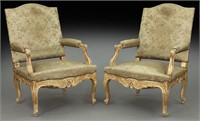 Large pair of French gilt carved open armchairs