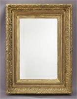 Carved and giltwood rectangular mirror,