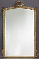Louis XVI style carved gilt framed mirror
