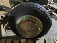 Adjustable gauge wheel with sprocket
