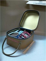 Vintage make up case with costume jewelry, hair