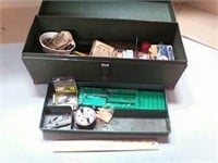 Metal toolbox with fishing supplies.